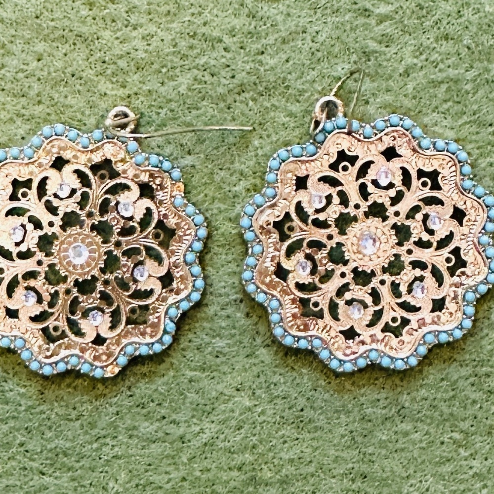 Gold earrings with blue beads